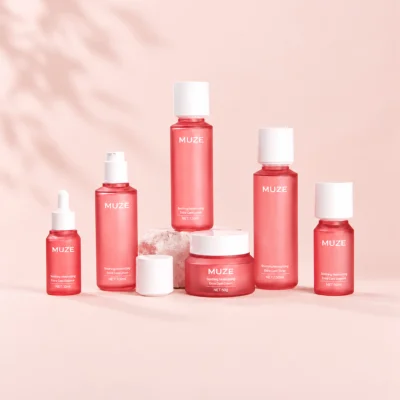 Custom skincare packaging set with bottles, dropper bottle and cream jar by MUZE Packaging